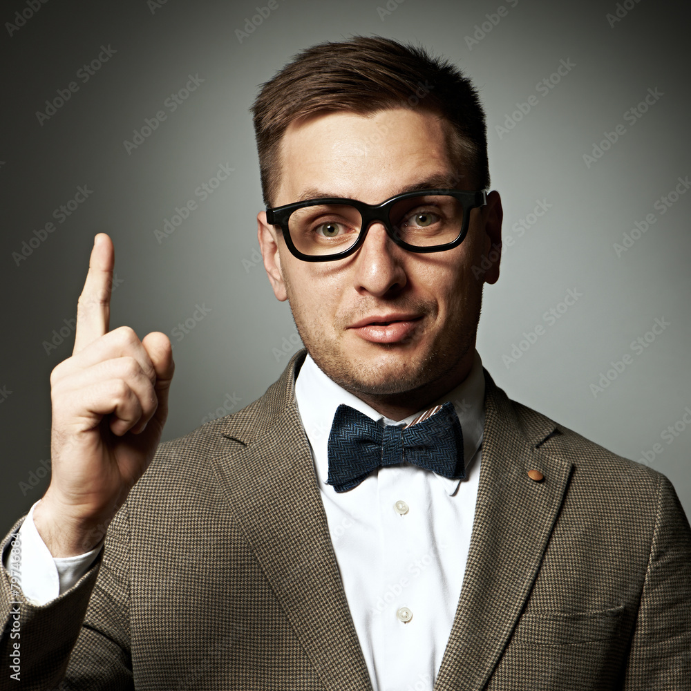 Confident nerd in eyeglasses and bow tie Confident nerd in eyeglasses and bow tie