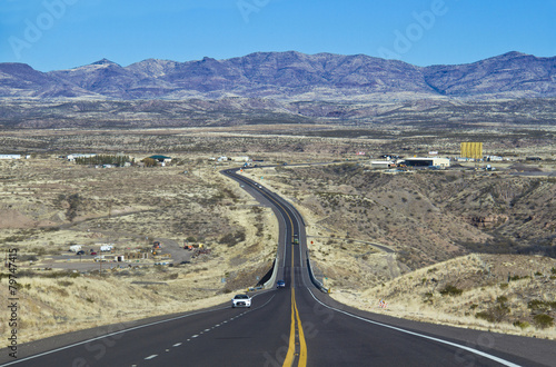 asphalt road and expanse of Nevada