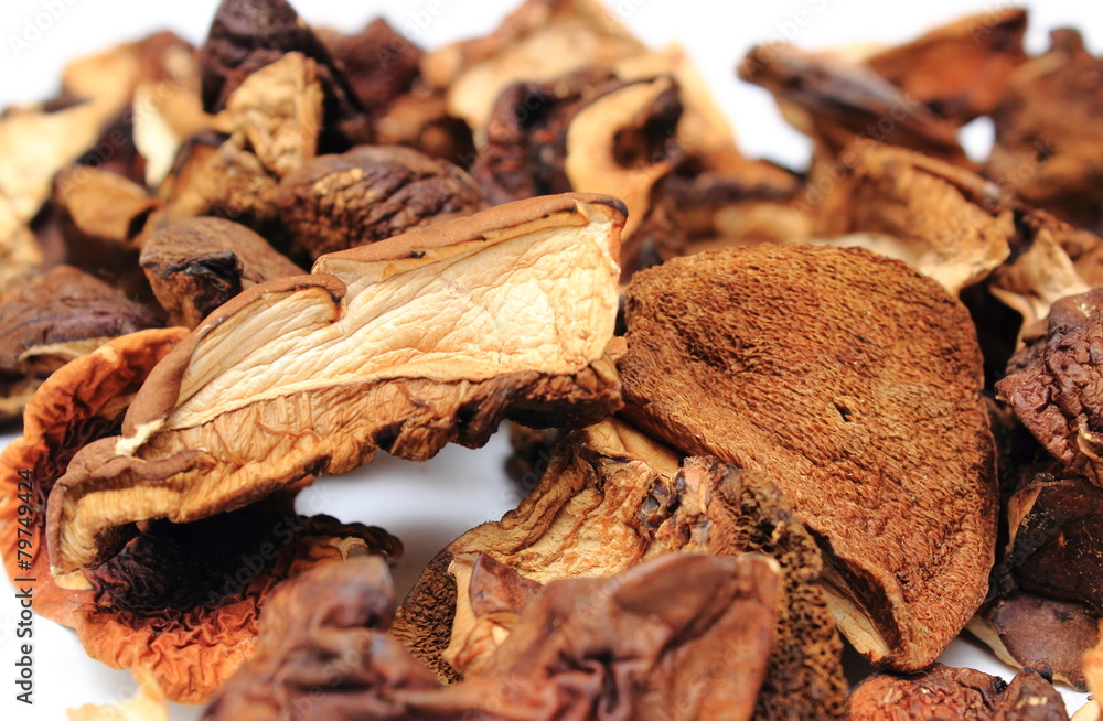 Heap of dried mushrooms on white background Heap of dried mushrooms on white background