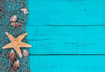 Blank sign with seashells and starfish in fish net border