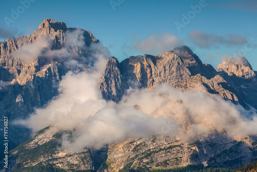 Gruppo Del Cristallo mountain range at foggy summer morning