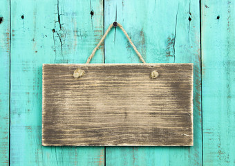 Blank wood sign hanging on antique painted background