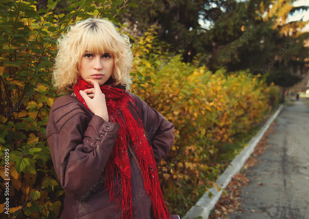 Young woman in the autumn park Young woman in the autumn park