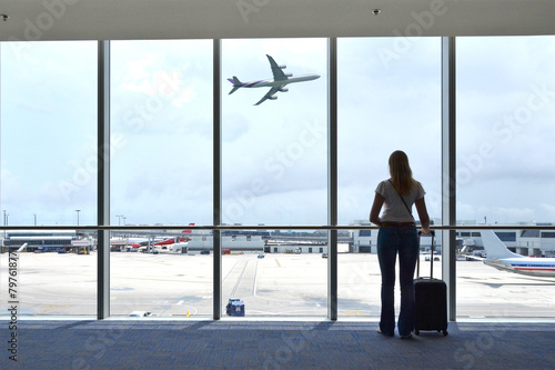 Girl at the airport window
