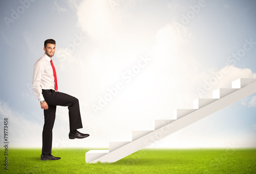 Business person climbing up on white staircase in nature © ra2 studio