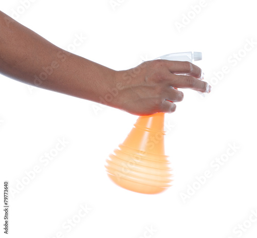 hand holding spray bottle