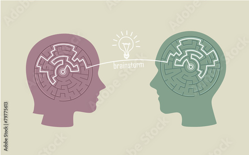 silhouette of heads with a labyrinth inside