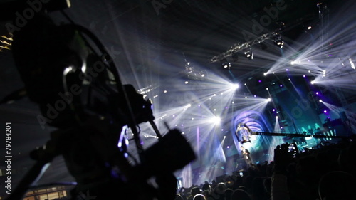 Television production on the set of a large rock concert