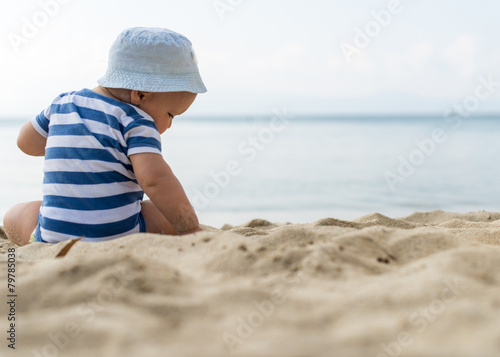  baby boy on the beach © poplasen