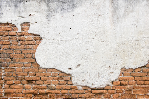 white exposed brick concrete wall. © badztua