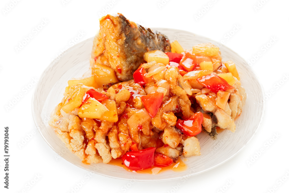 Deep fried carp in sweet-sour sauce, isolated Deep fried carp in sweet-sour sauce, isolated