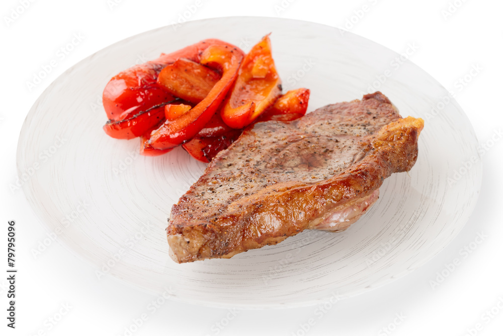 New York steak with grilled bell pepper, isolated