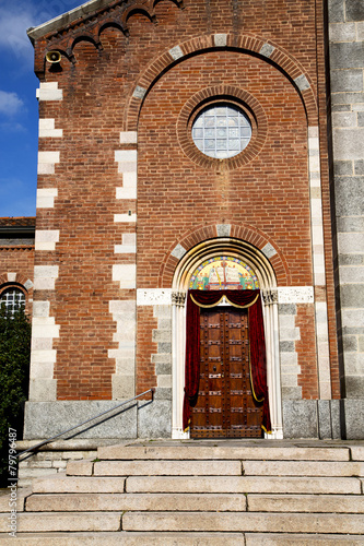 church  in  the samarate     brick tower sidewalk italy  lombar photo