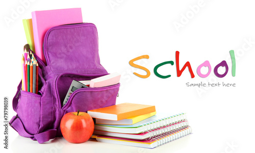 Foto Purple backpack with school supplies isolated on white