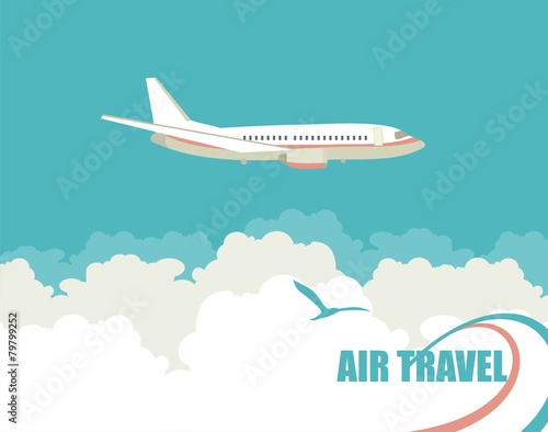 The plane flies against the sky