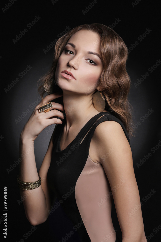 Beautiful young woman in jewelery