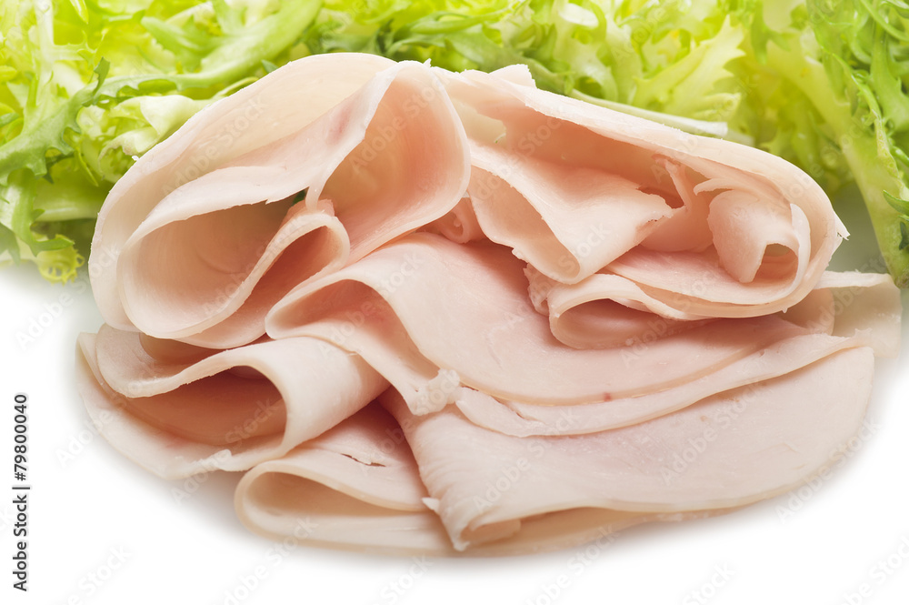 Turkey meat slices with salad on the white