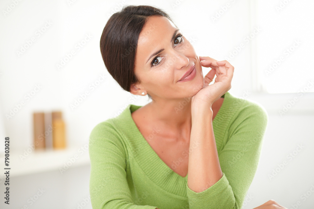 Friendly latin lady smiling at home Friendly latin lady smiling at home