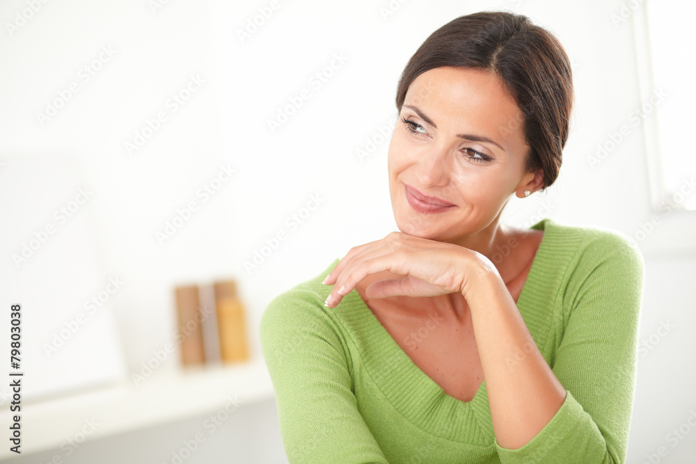Lovely woman with natural beauty looking satisfied Lovely woman with natural beauty looking satisfied