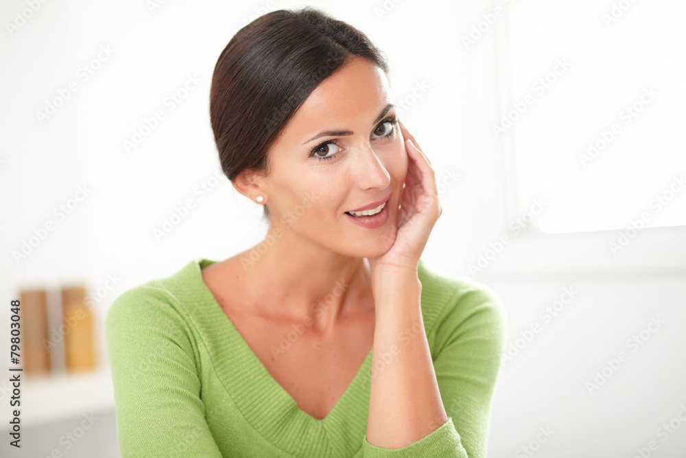 Lovely sophisticated lady smiling at home Lovely sophisticated lady smiling at home