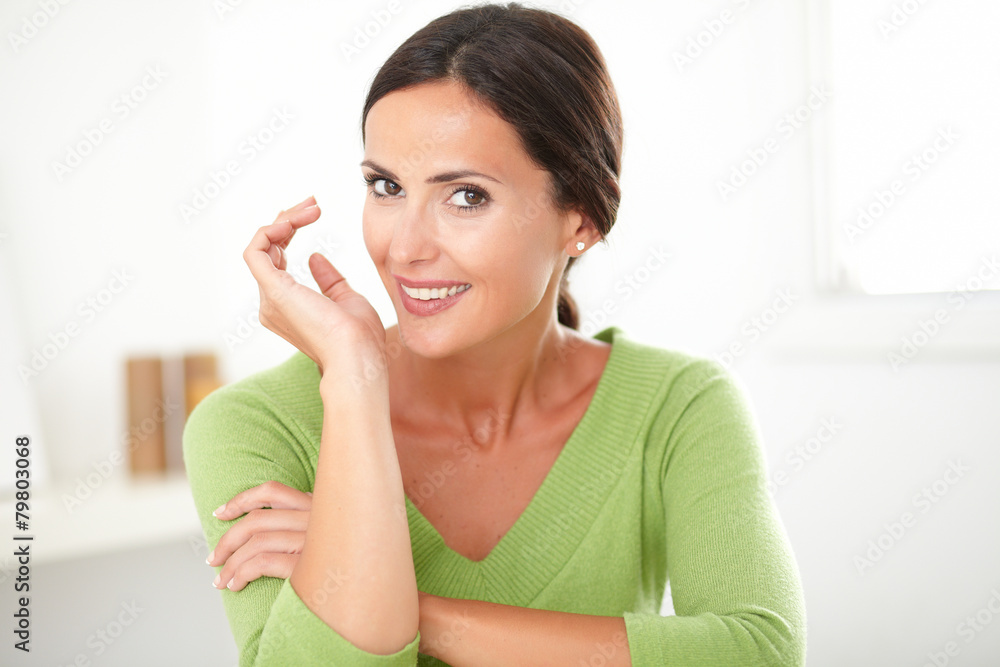 Elegant friendly girl smiling with sincerity Elegant friendly girl smiling with sincerity