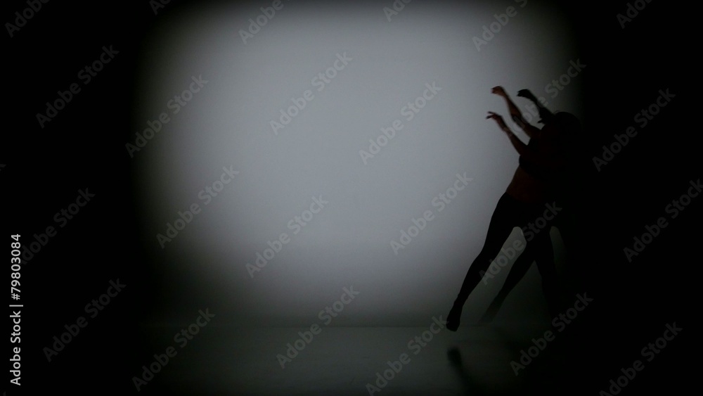 Contemp moves on a black background, spot light Contemp moves on a black background, spot light