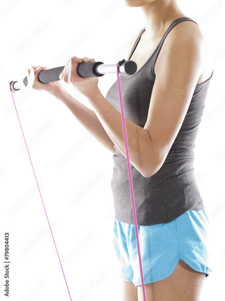 Naklejka premium girl exercising with a gym stick