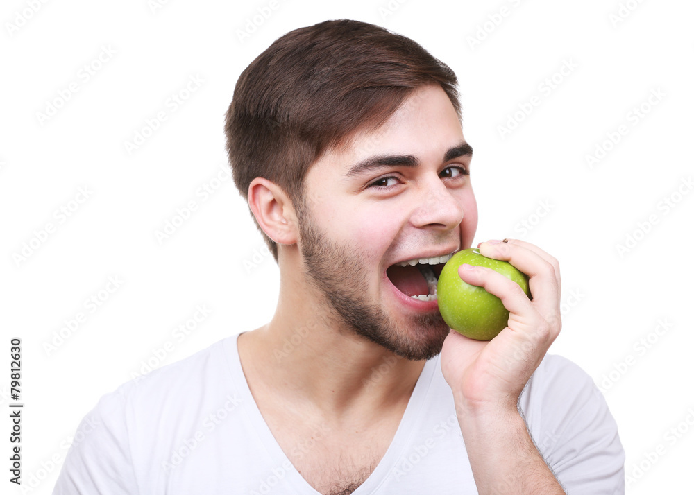 Portrait of young man with green apple isolated on white Portrait of young man with green apple isolated on white