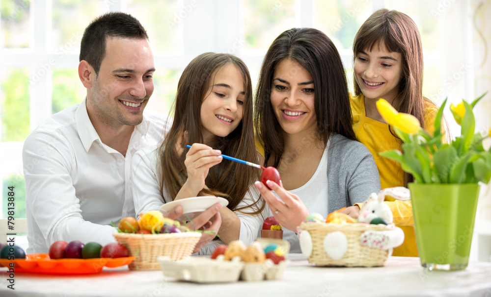 Mother and father with daughters on Easter