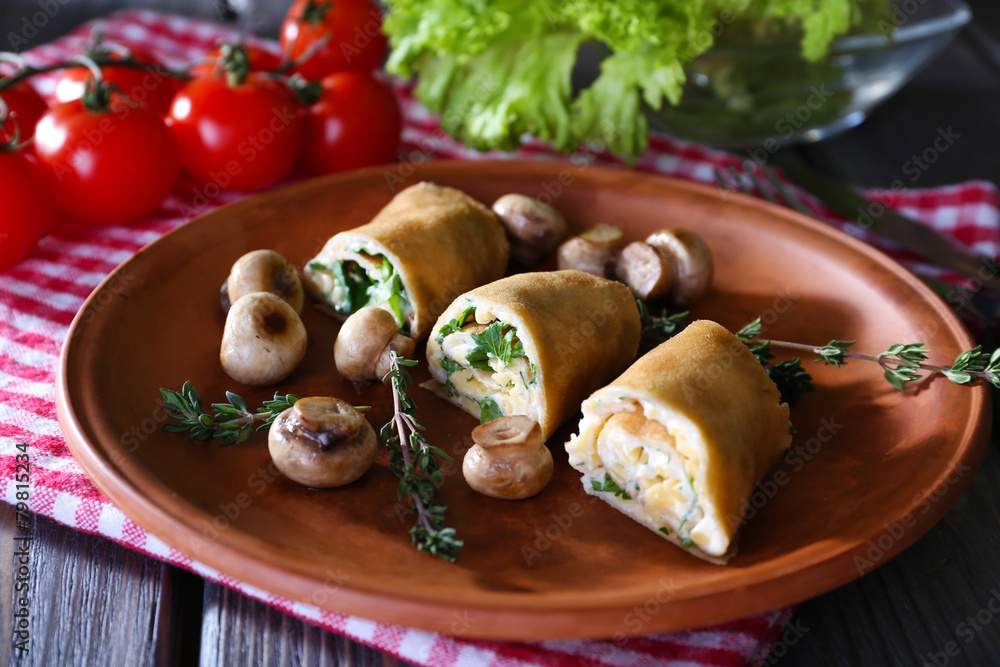 Pancakes with creamy mushrooms in plate on wooden table, Pancakes with creamy mushrooms in plate on wooden table,