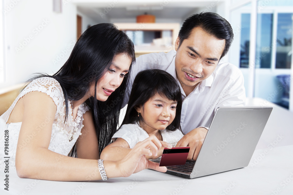 Family doing online shopping at home Family doing online shopping at home