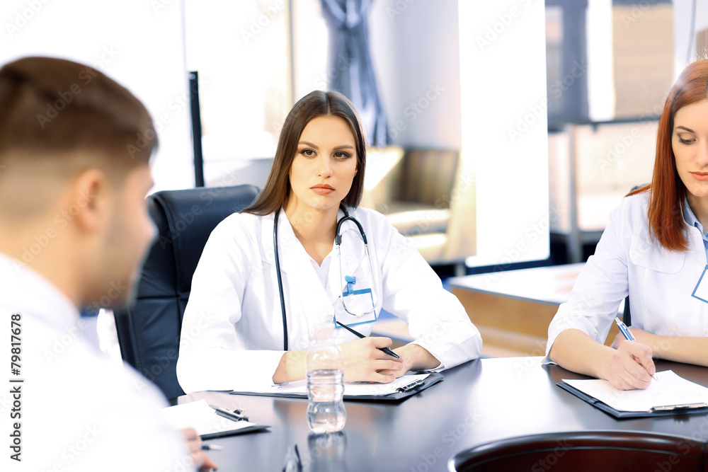 Medical workers working in conference room Medical workers working in conference room