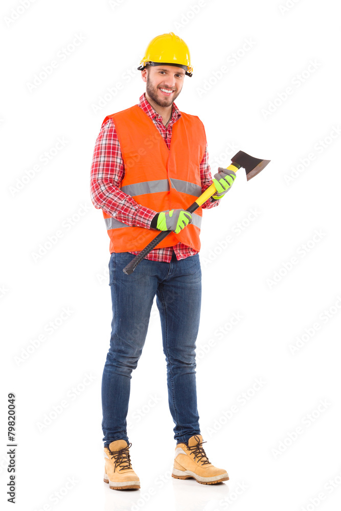 Full length lumberjack standing with an axe. Full length lumberjack standing with an axe.