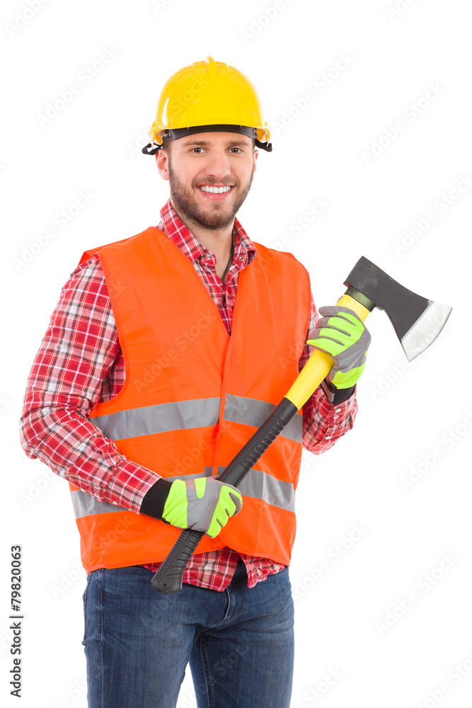 Smiling lumberjack posing with an axe Smiling lumberjack posing with an axe