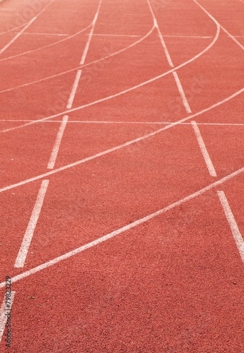 Lines and arrows of running racetrack in outdoor stadium