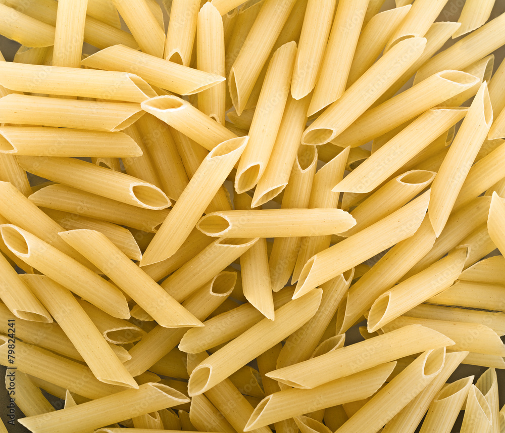 Dried penne rigatte background Dried penne rigatte background