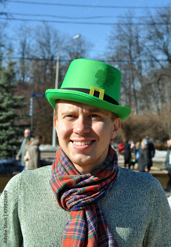 Smiling guy during St Patrick's day party 