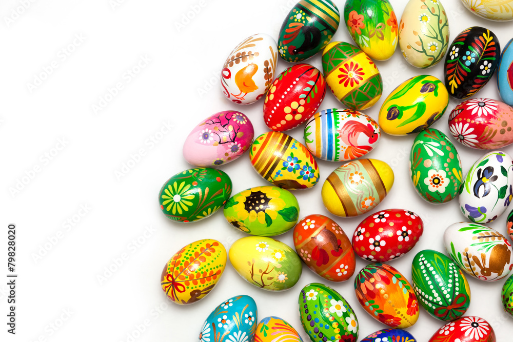 Naklejka premium Traditional hand painted Easter eggs on white. Spring patterns
