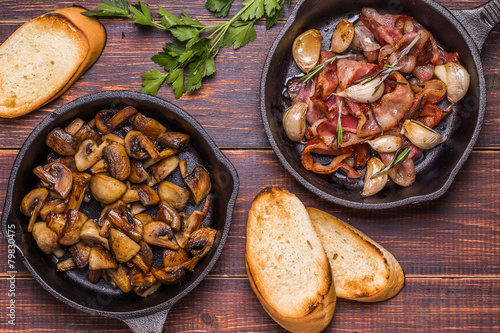 Fried mushrooms with bacon, garlic, rosemary
