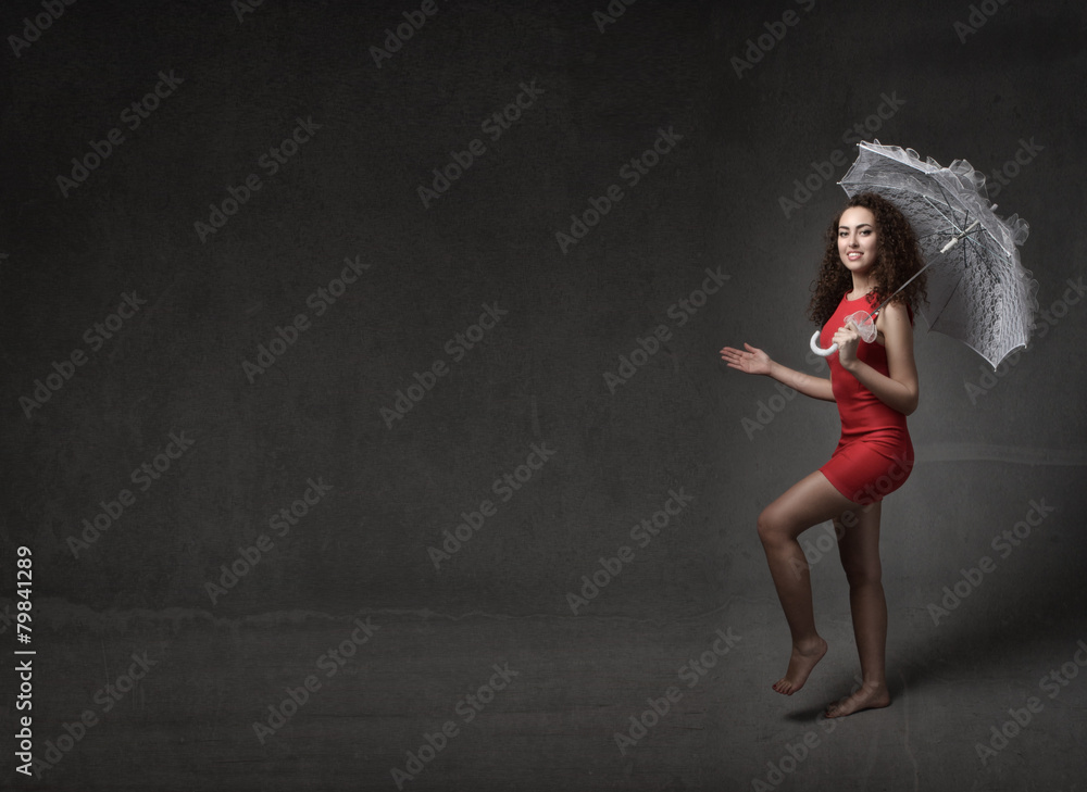 girl walking with umbrella