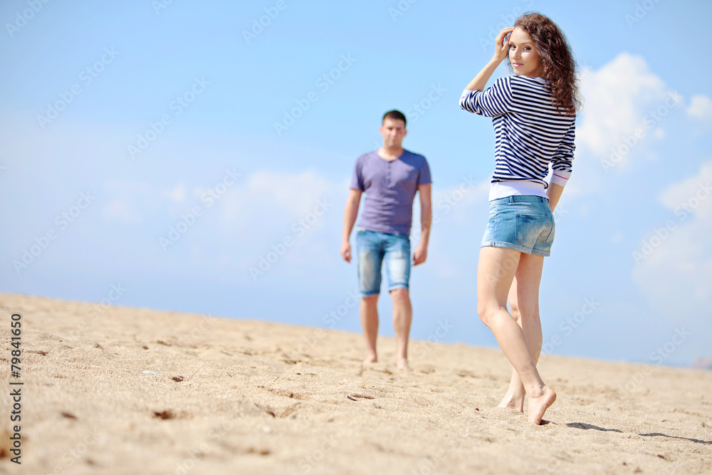happy people are relaxing on a beach happy people are relaxing on a beach
