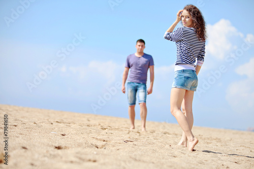 happy people are relaxing on a beach