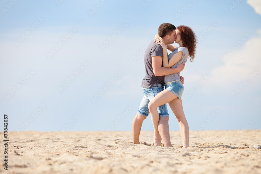 happy people are relaxing on a beach happy people are relaxing on a beach