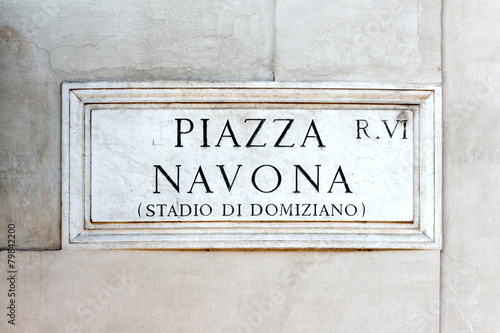 Piazza Navona sign on historic italian building in Rome © Natalia Bratslavsky