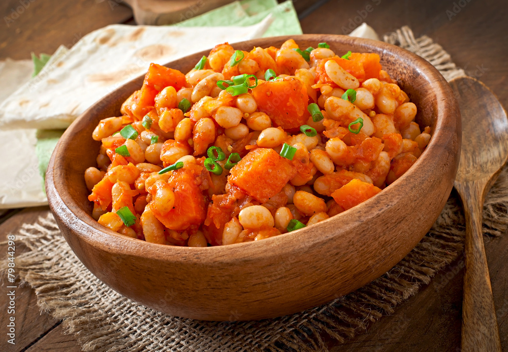Stewed white beans and sliced pumpkin in tomato sauce Stewed white beans and sliced pumpkin in tomato sauce
