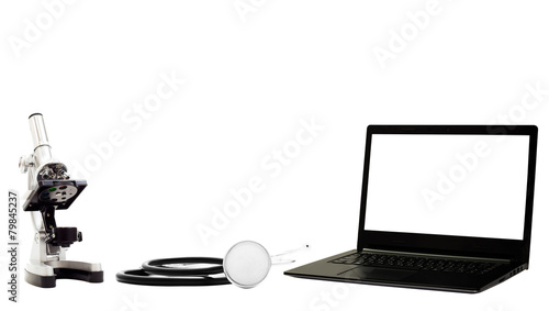 stethoscope and microscope and computer on a white background is