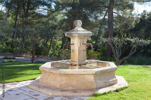 Typical stone fountain in Provence, France