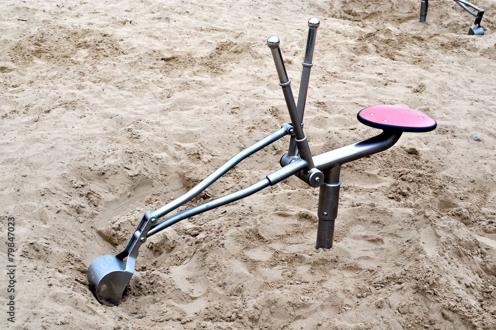 Bagger - Spielzeug für den Sandkasten – Stock-Foto | Adobe Stock