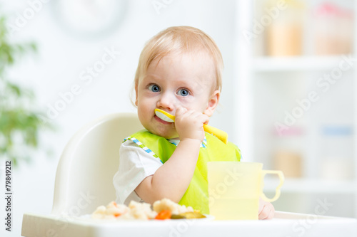 child eating healthy food