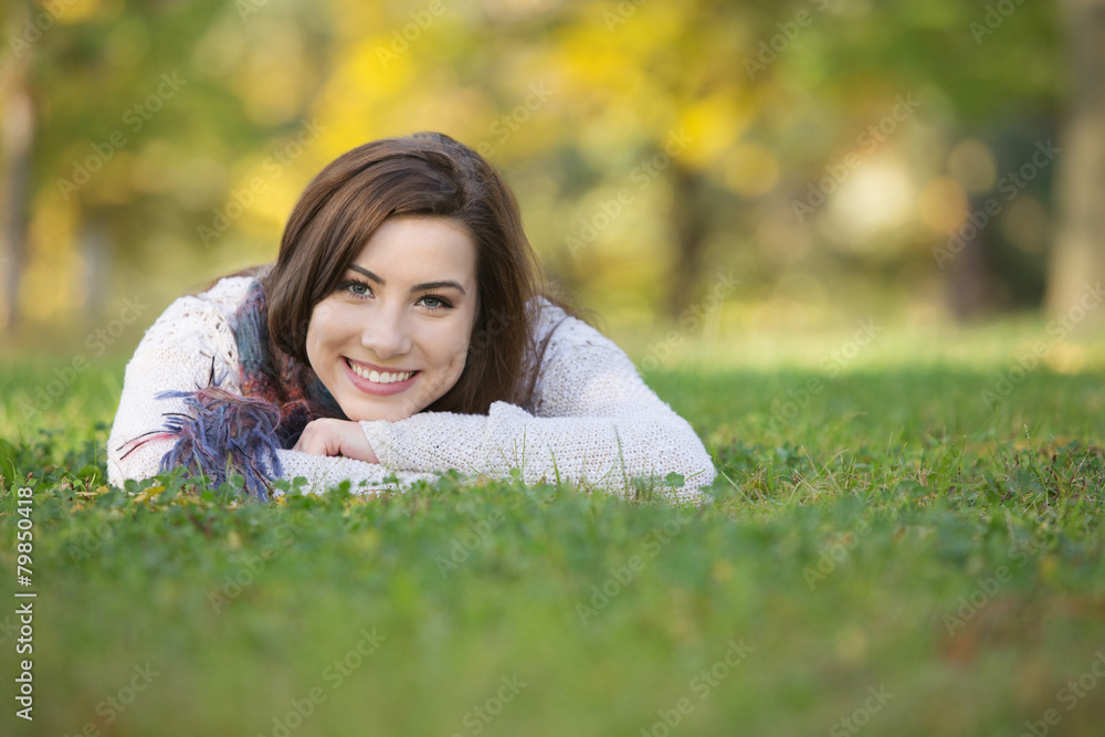 Happy Teen Laying On Grass